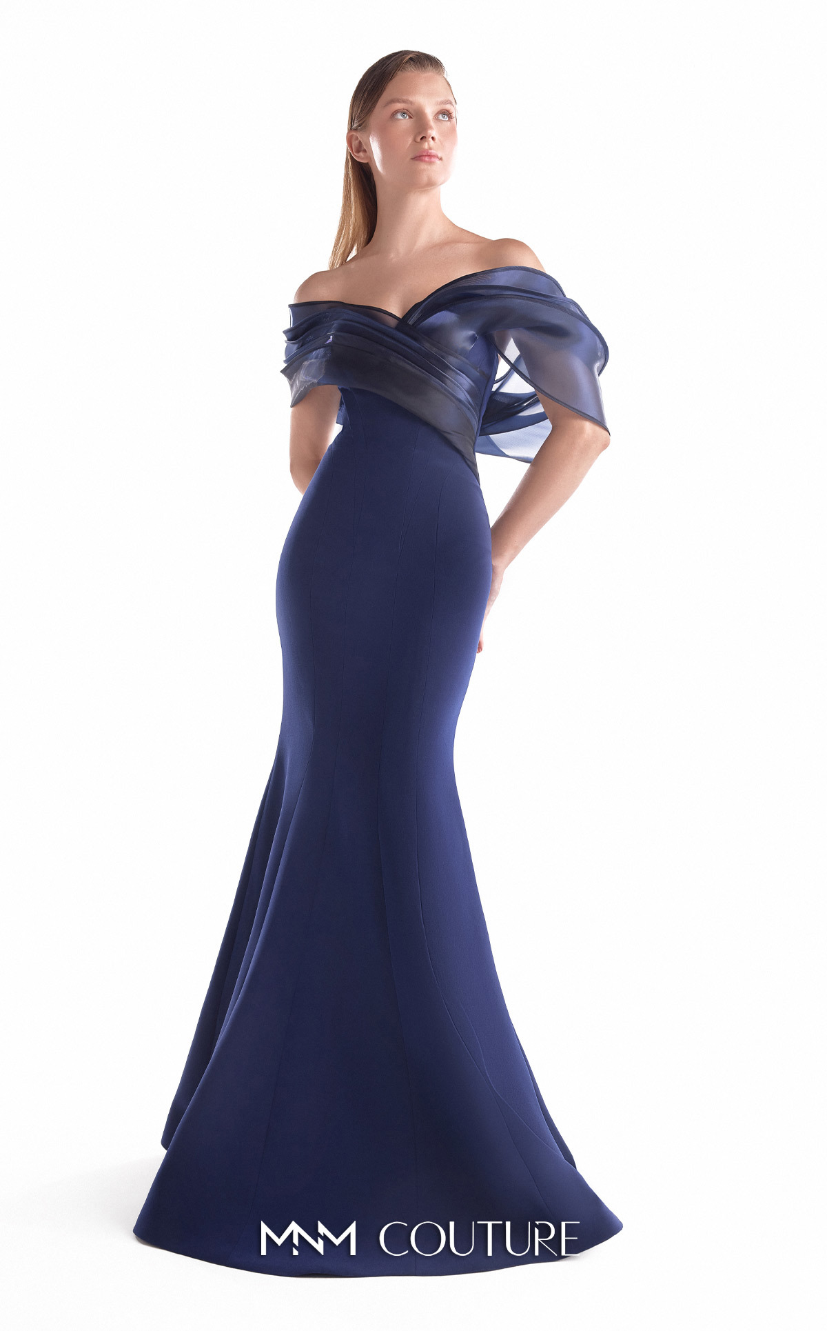 MNM Couture G2144 Navy crepe mermaid gown with off-shoulder midnight blue liquid organza draping.